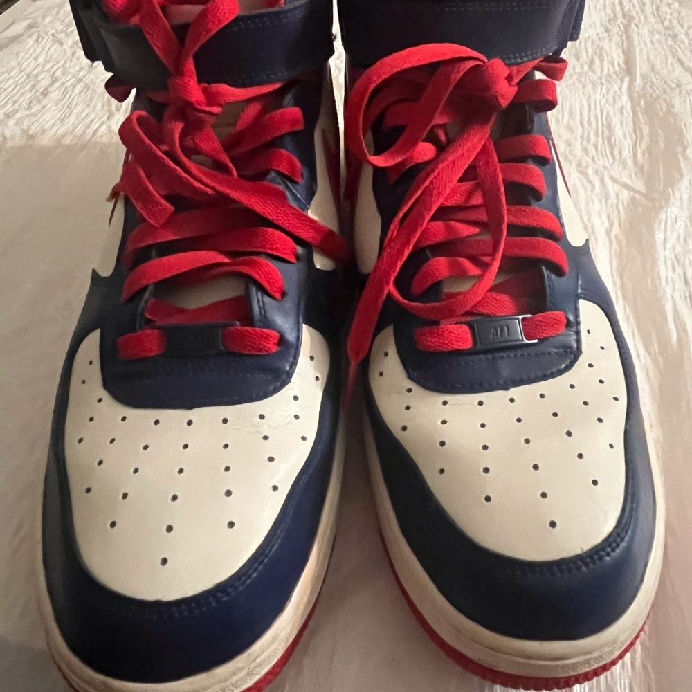 Nike Air Force High-Top Sneakers.